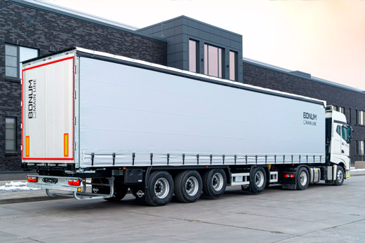 Шторный полуприцеп 13,62 м с вынесенной осью для перевозки рулонов стали