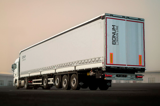 Шторно-бортовой полуприцеп 16,52 м с вынесенной осью